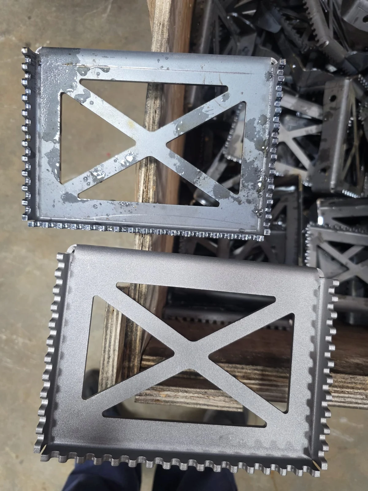 Two prepared steel frames with cross bracing