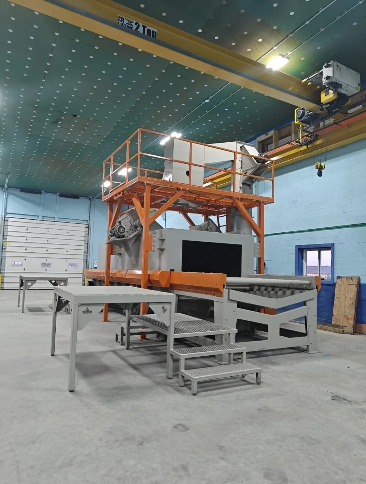 Industrial processing equipment and roller conveyors inside the facility